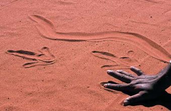 australian walk project desert sand with hand.